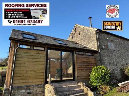 Completed red tiled hip roof with secure ridge and hip tiles for roofing work in Oswestry
