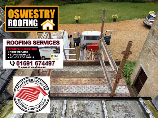 Natural slates being laid in straight courses over breathable membrane and timber battens for roofing work in Oswestry