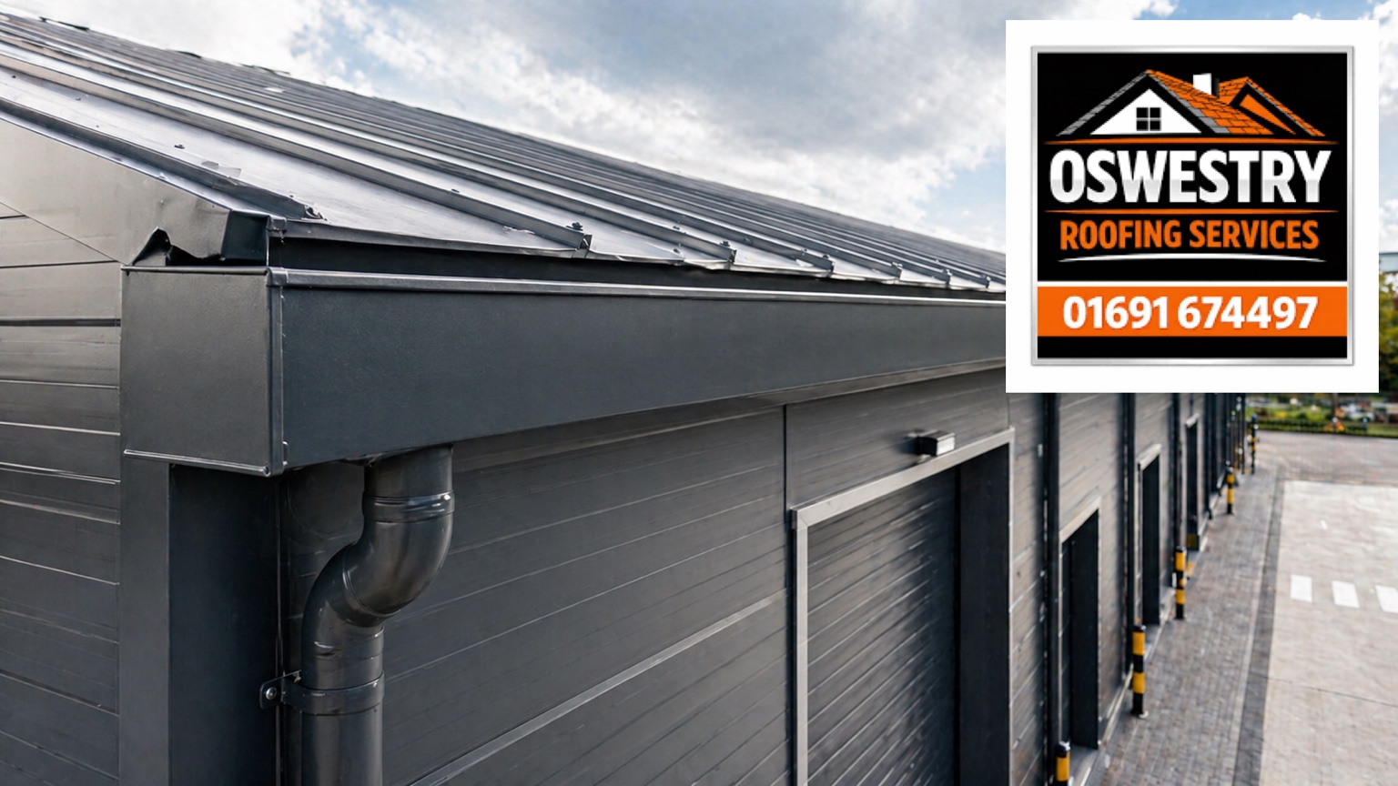 Box gutter and downpipe on a commercial building