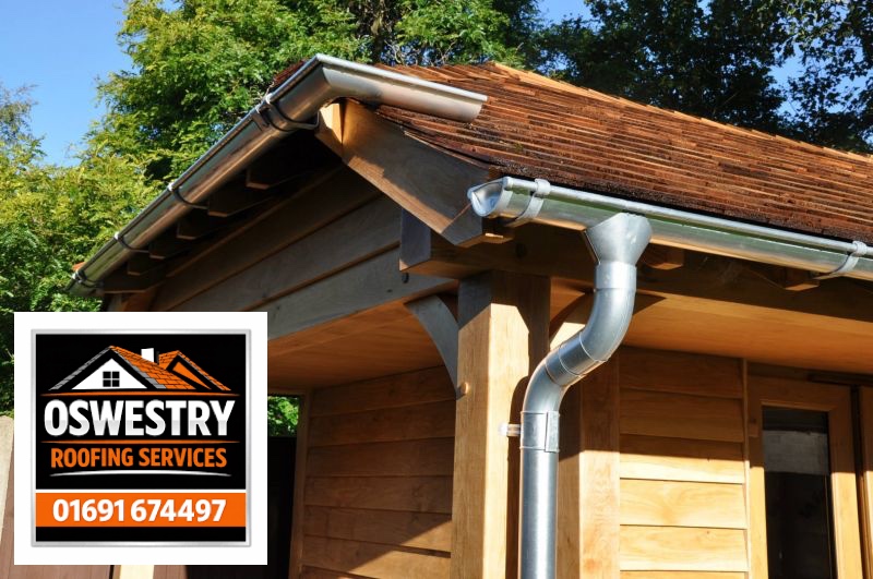 Metal gutters and downpipe on a timber building
