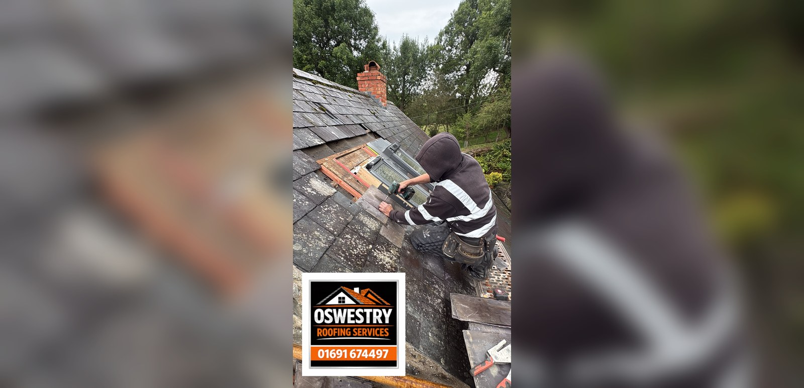 Roofer working on a tiled roof repair with new battens by Oswestry Roofing